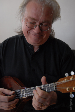 Peter playing the mandolin